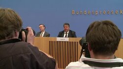 CLEAN : Germany stands firm on austerity as it cuts growth outlook News Clip