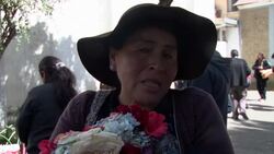 Bolivians decorate skulls to honour their dead Instructional Video