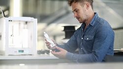 Designer with 3d printer Stock Footage