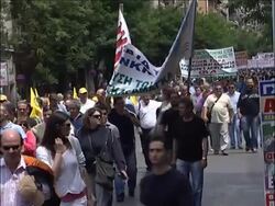 Thousands march in general strike as unions challenge cuts News Clip