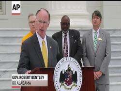 Alabama Gov. Robert Bentley marked the anniversary of the storms that ravaged the state a year ago. He stood at the foot of the Capitol and was flanked on either side by 253 Alabama flags, one for each of the storm''s casualties. News Clip