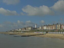 Southwold,colourful beach huts,Lighthouse,WS Stock Footage
