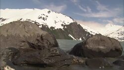 Arctic Ocean seawater splashes around rock formations in Alaska. Stock Footage