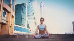Young Woman Doing Yoga Meditation Exercises at Sunset Stock Footage