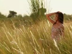 Young woman standing in the forest, Haryana, India Stock Footage