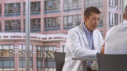 DS Male doctor in meeting with the project manager Stock Footage