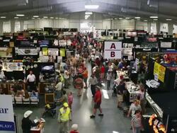 Mass of people in a crowded exhibition building at a State Fair. Stock Footage