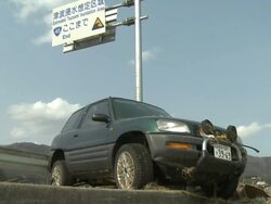 Destruction in Rikuzentakata, Iwate Prefecture, Japan on 2nd April 2011; 3 weeks after the tsunami following the Tohuku earthquake of March 2011. Stock Footage
