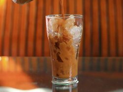Pouring Iced Coffee Stock Footage