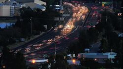 US Highway 101 in Marin County California at evening rush hour.  Photograph shows the rush hour traffic heading both north and south along a major interstate artery just north of San Francisco, California. Stock Footage