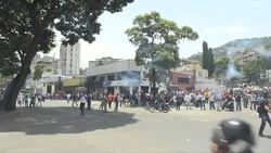 CLEAN : Venezuelan police fire tear gas at anti-Maduro protesters News Clip