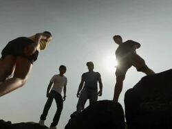 Three young man ready to help a young woman  Stock Footage