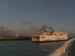 MS Ferry at entrance of port with pier / Ostend, Flanders, Belgium Stock Footage