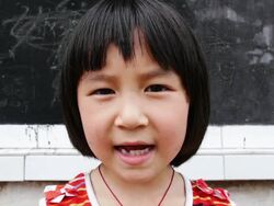 Chinese school girl singing Stock Footage