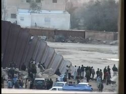 WRAP Palestinians clash with Egyptian army at border ADDS shots News Clip