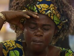 CU Shot of woman praying in church / Lagos, Nigeria Stock Footage