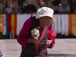 Jokhang Temple in Lhasa and pilgrims at prayer News Clip