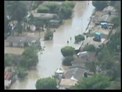 Rescuers try to reach people stranded by floods Instructional Video