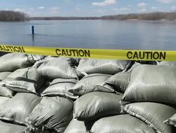 Sandbag Wall Holding Back the Mississippi River Stock Footage
