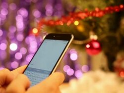 Texting at smartphone for Christmas Stock Footage