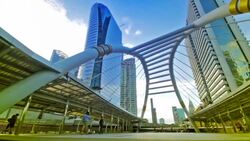 Bangkok metro station junction with landmark and people walking for public transportation Stock Footage
