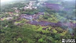 Aerial video shows the path lava has carved across a portion of Hawaii's big island, threatening homes in the town of Pahoa. Officials say the flow was just over 230 yards from a roadway Thursday morning. (Oct. 30) News Clip