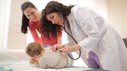 Listening to heartbeat Stock Footage