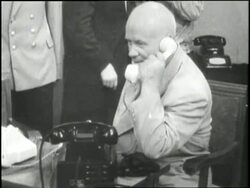 Soviet Premier Nikita Khrushchev speaks on the telephone with Soviet cosmonaut Andrian Nikolayev aboard the Vostok-3. News Clip