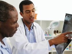 Young doctor with Old man Stock Footage