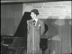 Vaudeville performer Ray Bolger performs for sailors and soldiers in the canteen. News Clip
