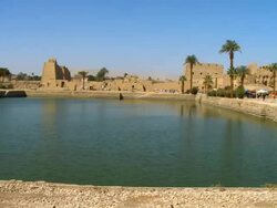 WS PAN View of sacred lake at temple of Karnak / Luxor, Egypt Stock Footage