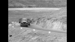 Military convoy carries Lend-Lease material across rough Iranian terrain News Clip