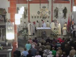MS Short of catholic mass, curch St. Marien Saarburg-Beurig, with cardinal Meisner, Cologne / Saarburg, Rhineland Palatinate, Germany Stock Footage
