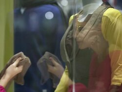 HD: Young Woman Having Fun Window Shopping Stock Footage
