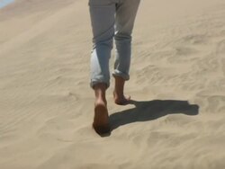 MS TS Boy walking on sand dune / Cape Kiwanda, Oregon, USA Stock Footage