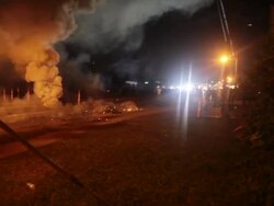 Police fire tear gas at protesters Ferguson, Mo. Stock Footage
