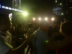 people celebrating on street in circle and waving hands in hong kong, real time. Stock Footage