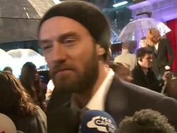 INTERVIEW: Jude Law. on working with Robert Downey Jr., being a looking better woman in drag, on the approach to this film at the Sherlock Holmes: A Game Of Shadows: European Premiere at Empire Leicester Square on December 08, 2011 in London, England Stock Footage