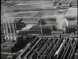 Factory smokestacks cause air pollution. News Clip