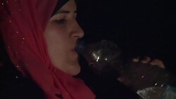 CLEAN : Migrants defy downpours to cross into the Balkans News Clip