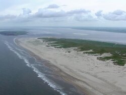 WS AERIAL View over coastline of Norderney island at Noth Sea / Norderney, Lower Saxony Stock Footage