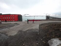 Approaching Barentsburg, second largest settlement on Svalbard archipelago Stock Footage