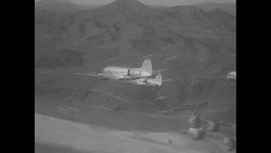 US paratroopers in practice jump in Korea during Korean War News Clip