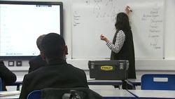 Secondary school maths pupils in lesson News Clip