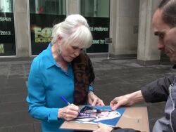 Linda Evans arrives at FOX & friends and signs for a fan in New York, NY, on 2/28/13. (Getty Images Entertainment Video) Stock Footage