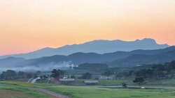 Time lapse of farmland at sunset Stock Footage