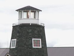 "CU of top of lighthouse of The Salty Dawg Saloon with light on, Homer Spit, Homer, Kenai Peninsula, Alaska." Stock Footage