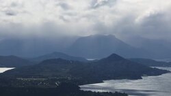 Storm clouds drift over the Andes Mountains near Nahuel-Huapi Lake. Stock Footage