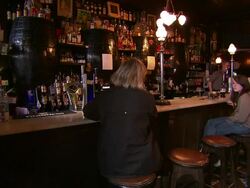People sit at a bar in Northern Ireland, talk, Northern Ireland Stock Footage