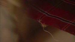 A loom weaves silk threads. Stock Footage